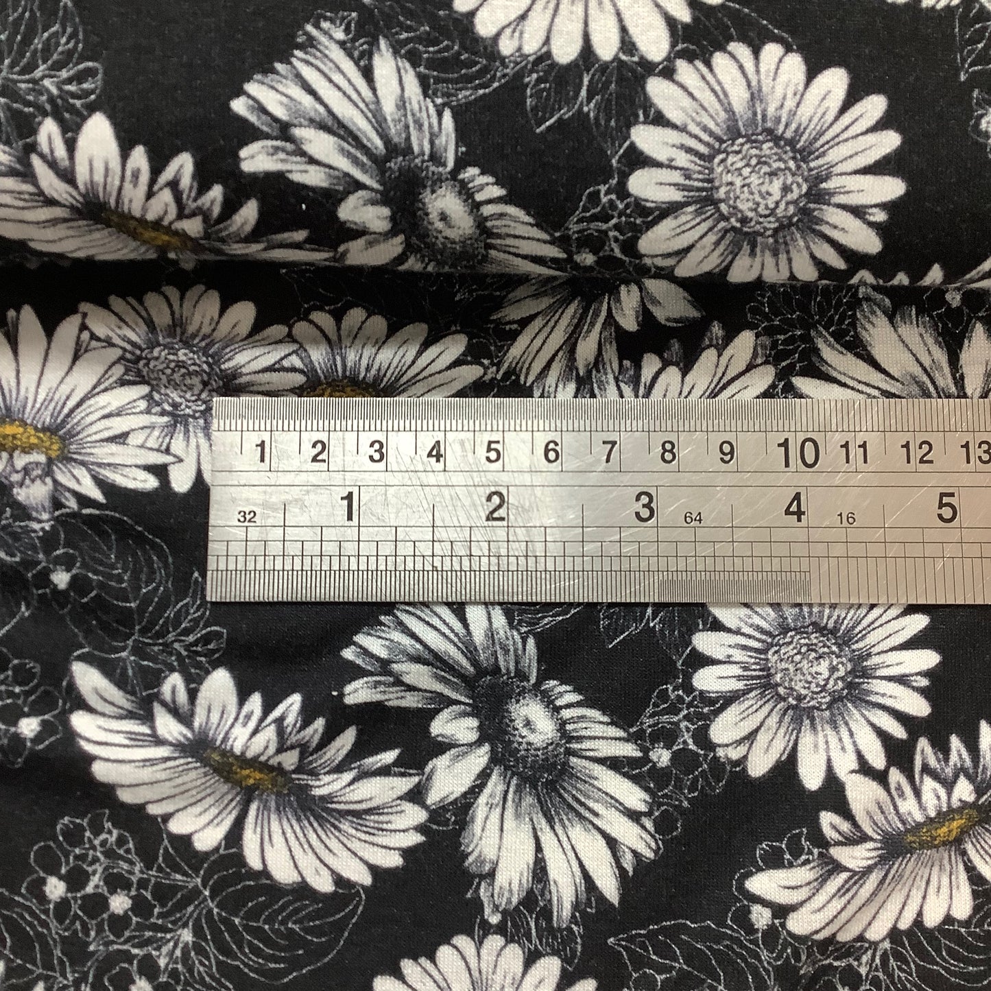 Lightweight Black Daisy Print Stretch Jersey Fabric 95% Viscose 5% Lycra Dressmaking