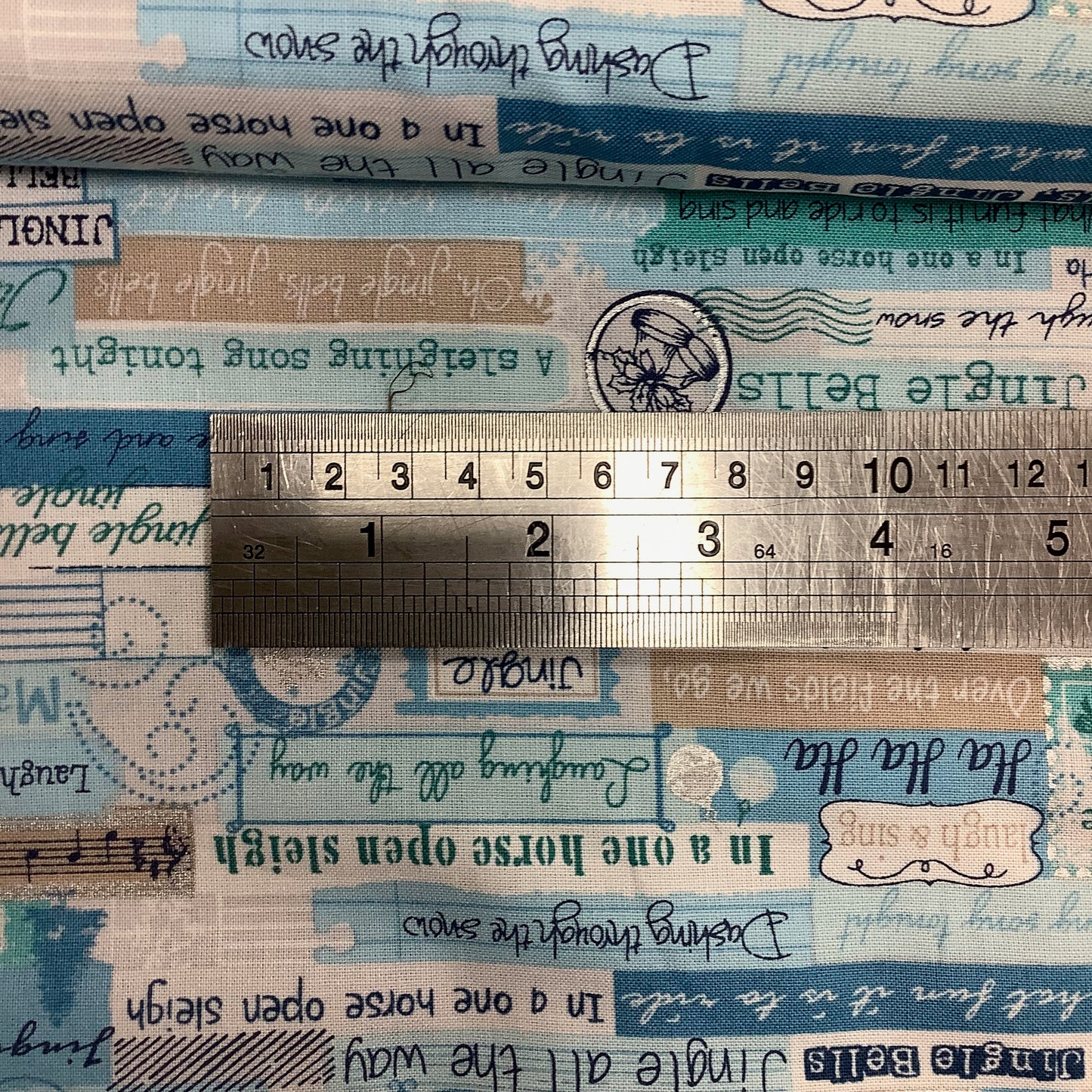 Marcus Fabrics Songbook Jingles Script on Blue 100% Premium Cotton Fabric R2105740750