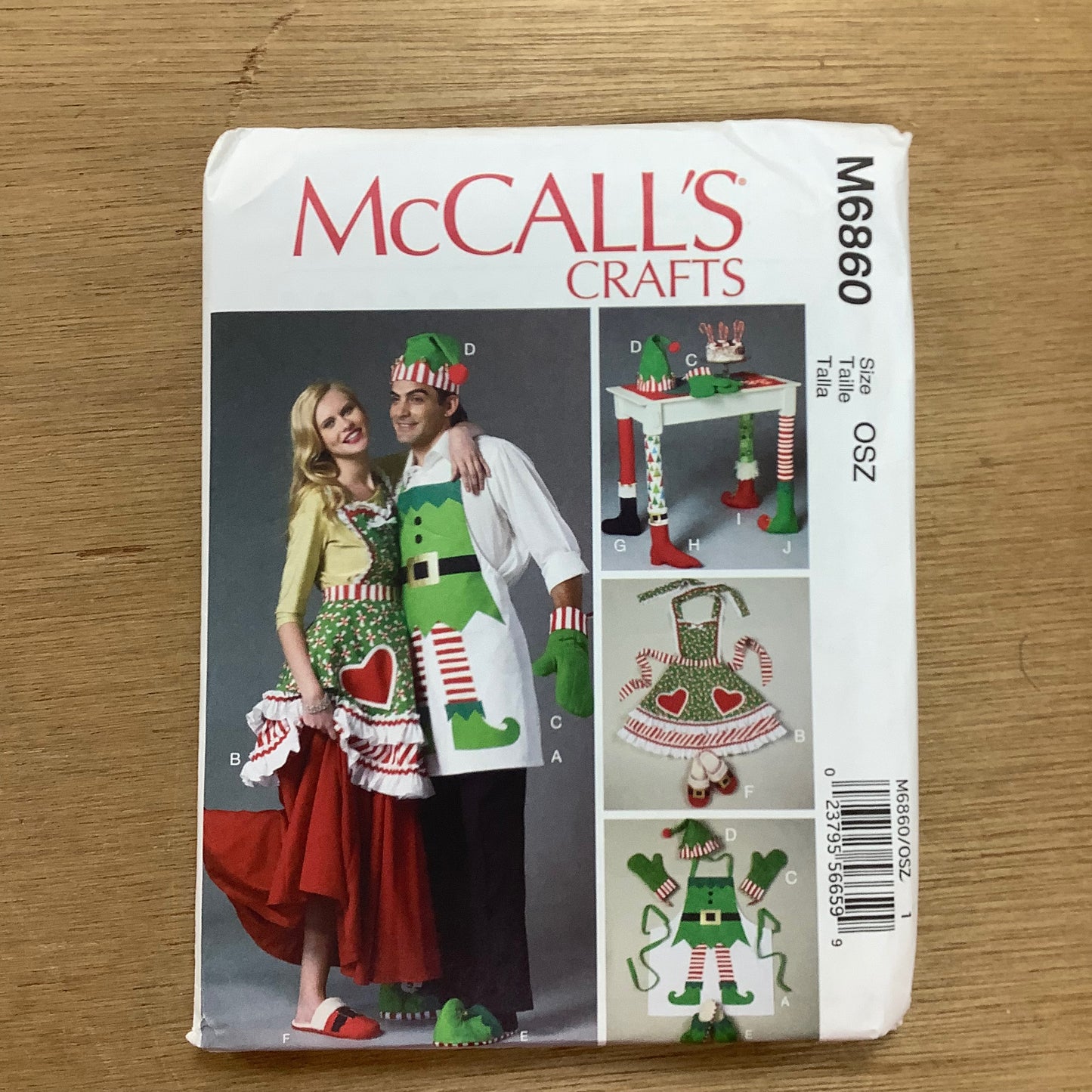 McCall's Craft Sewing Pattern Christmas Aprons Pattern Elf Hat Oven Mitt Slippers Table Leg Cover 6860