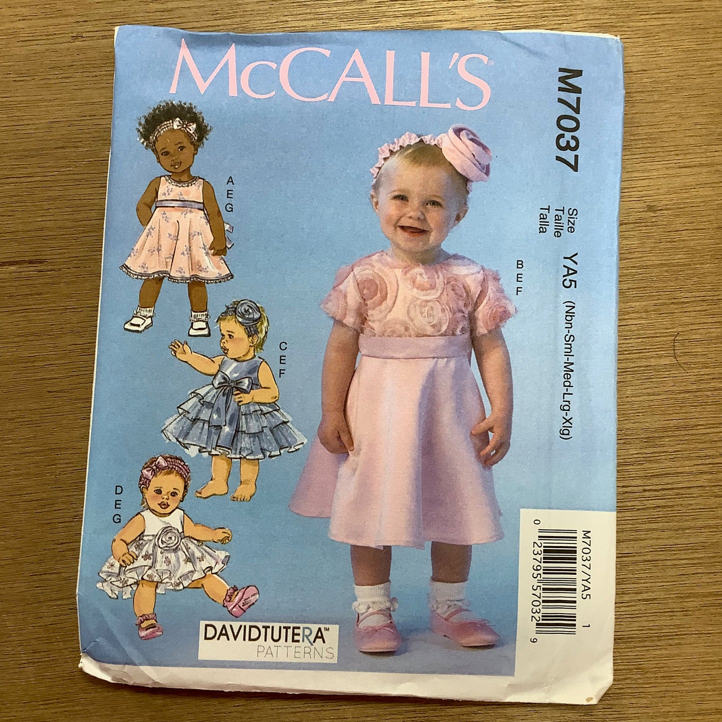 McCall's Dressmaking Sewing Pattern Classic Baby Dresses Including Rose Headband Size NB-XL 8-29 Lbs 7037