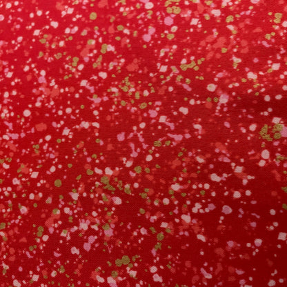 Dot pattern fabric swatch on a red background