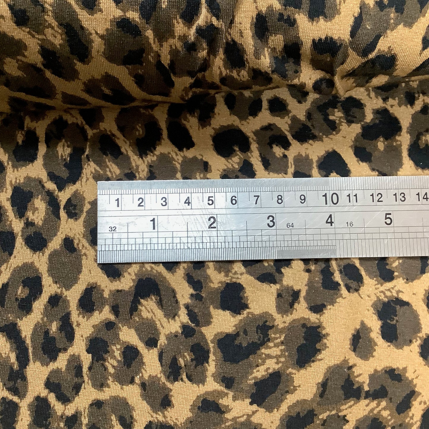 Lightweight Black and Brown Animal Print Stretch Jersey Fabric 95% Viscose 5% Lycra Dressmaking