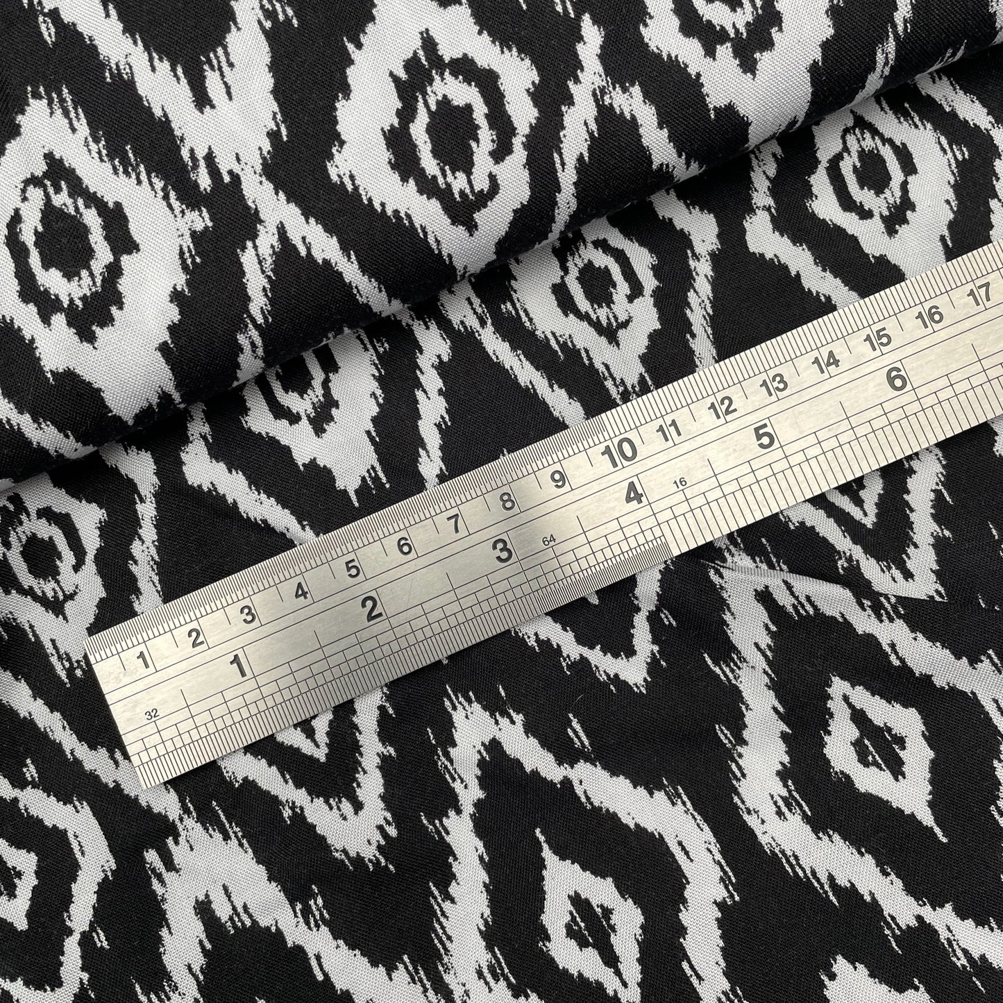 Black and White Diamond Abstract Woven Viscose Dressmaking Fabric