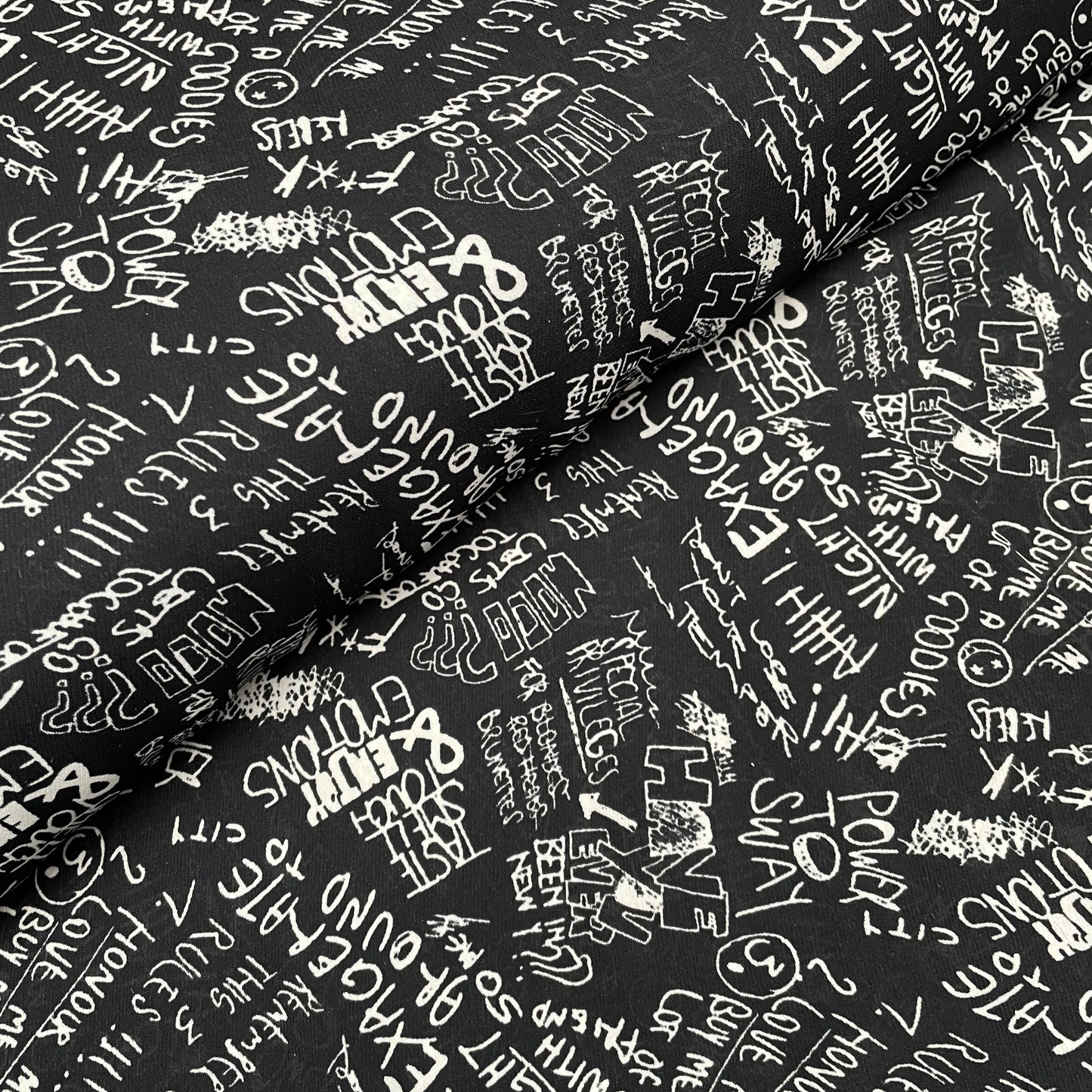Black and White Abstract Words Sayings Woven Polyester Dressmaking Fabric