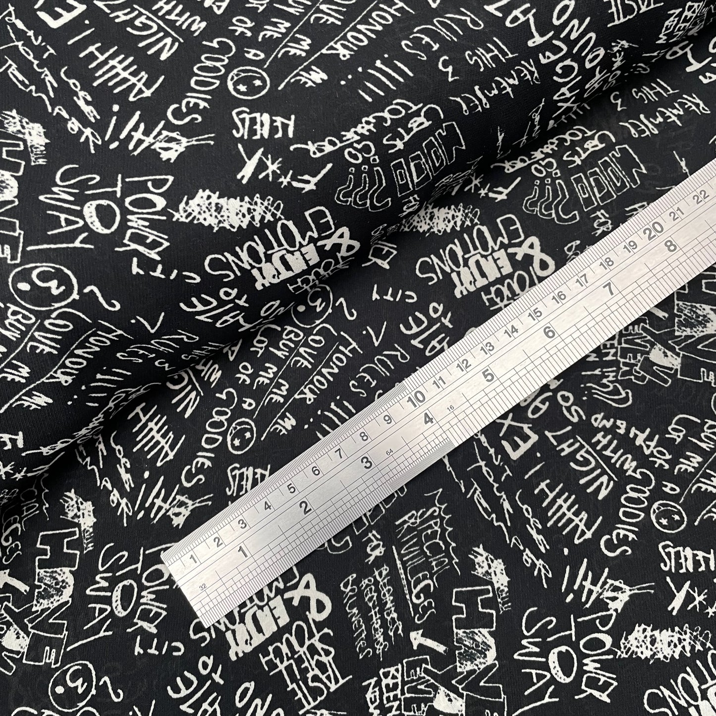 Black and White Abstract Words Sayings Woven Polyester Dressmaking Fabric